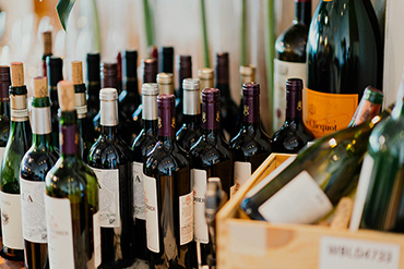 wine bottles, The Grounds offers affordable drink packages.